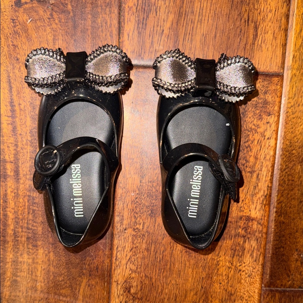 Mini Melissa Black Dress Shoes with Metallic Bow